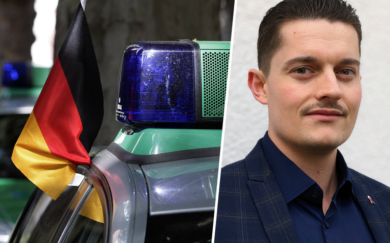 Deutsche Flagge an einem Streifenwagen während der Fußball-EM 2006, Autor Peter Heinemann (r.)