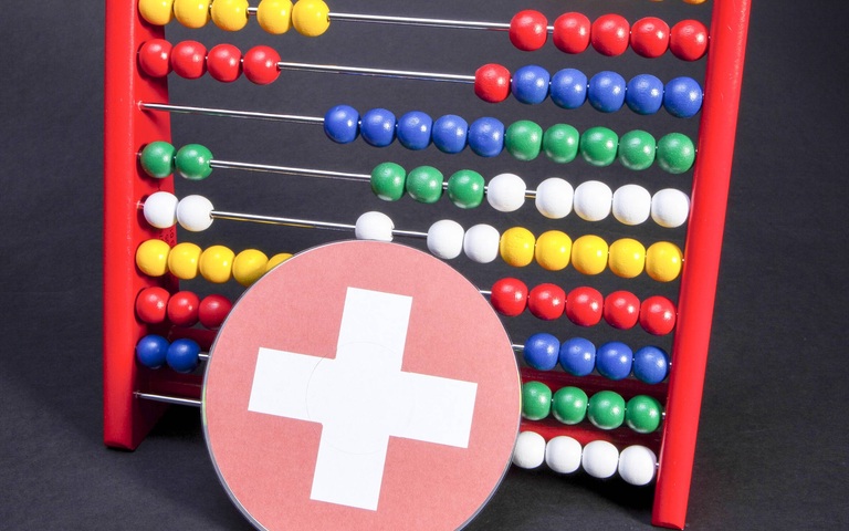 Rechenschieber mit Schweizer Flagge