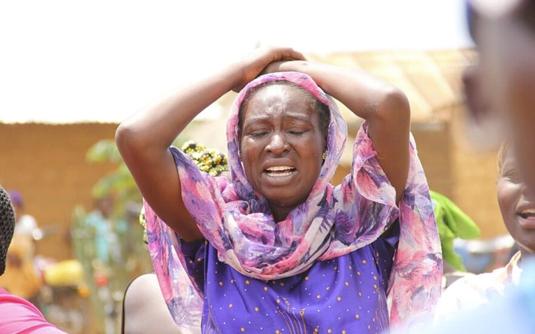 Verzweifelte nigerianische Frau (Symbolbild)